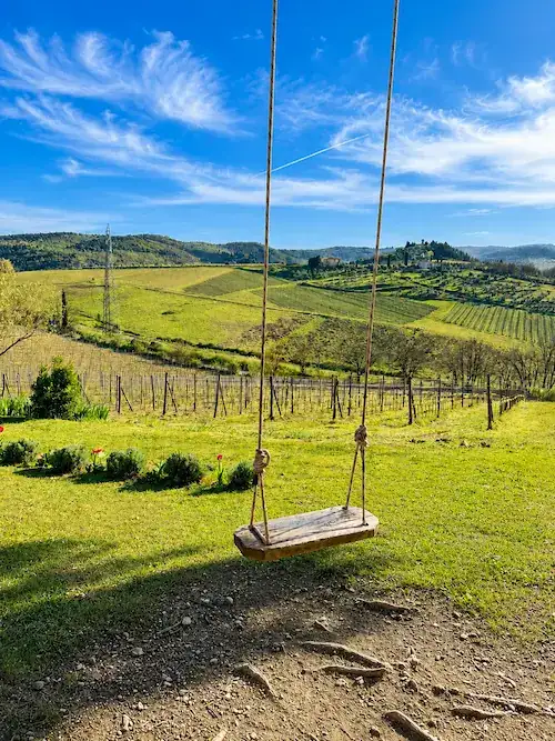 Jewish Florence Tuscany tours โ swing in Tuscan landscape at sunset
